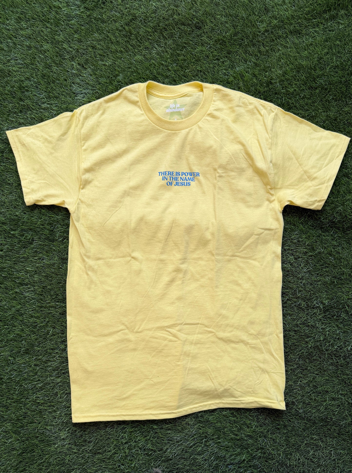 Power in the Name of Jesus Tee in Yellow